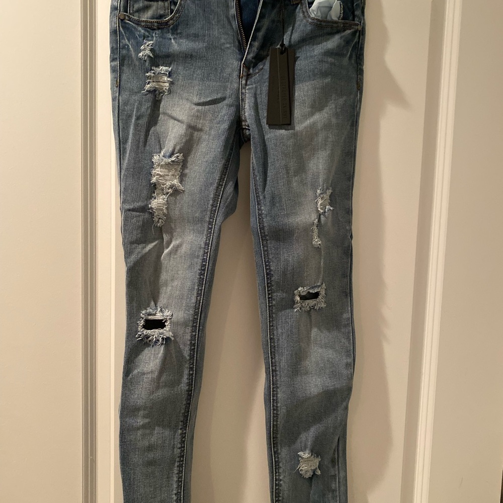 Black Label frayed hem skinny jeans. Size 27.